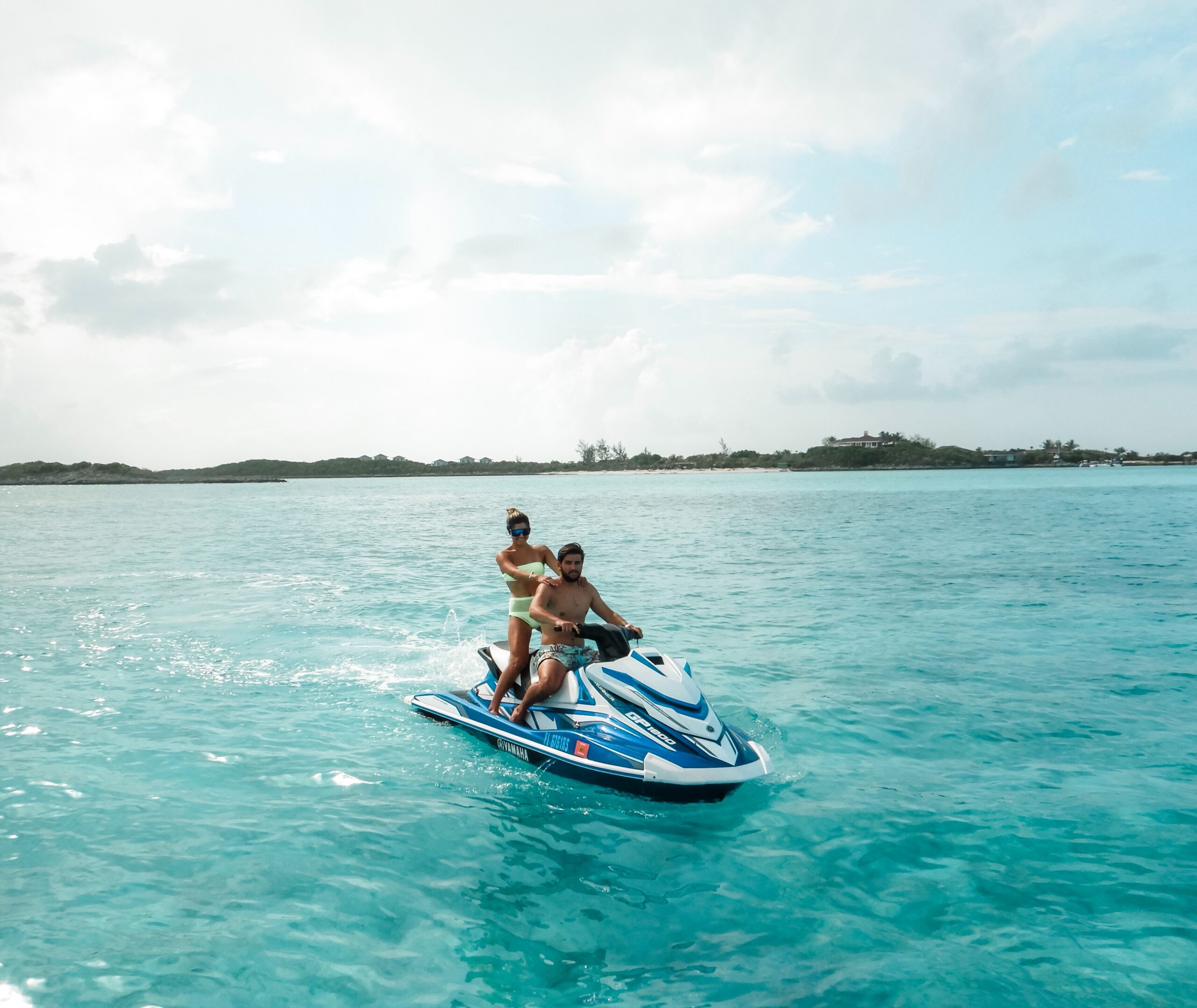 Couple riding a jetski