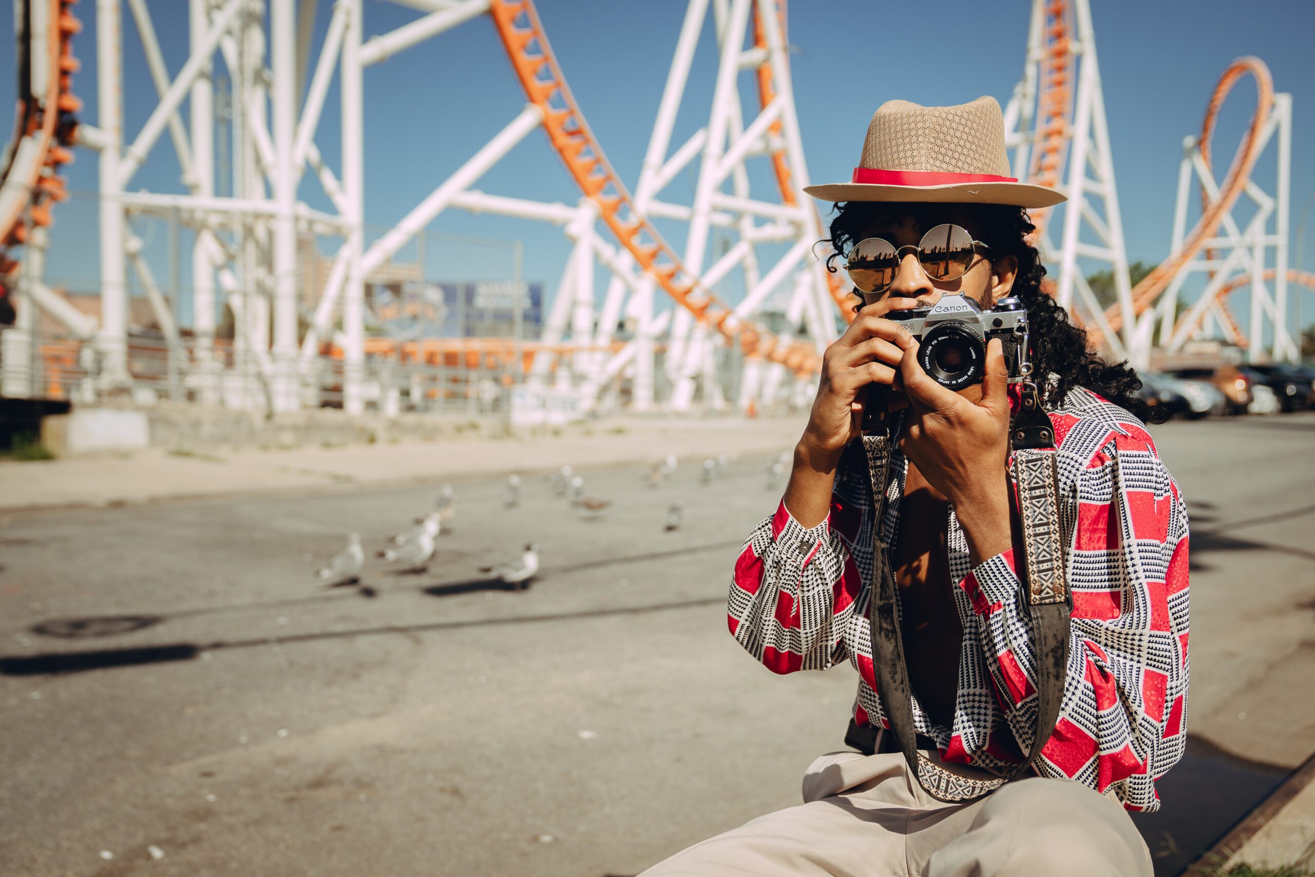 Man holding back and gray bridge camera