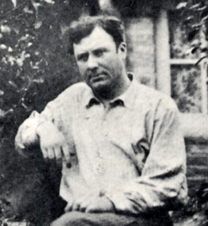Eugene Atget, man sitting, black and white