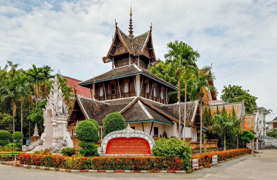 Chiang Mai museum and library, green trees, house with brown roof